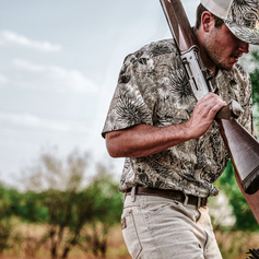 HUNTING SHIRTS. Hunter wears GameGuard short sleeve Original Shirt in cactus camo with MeshBack Cap. UPF 50+ hunting shirt, vented, stain-resistant, quick-dry outdoor apparel, performance field shirt, western camo gear, breathable moisture-wicking shirt.