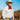 Man walking and ranching wearing Stone Stockyard Shirt.