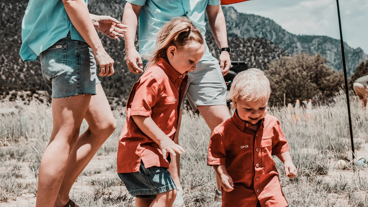 YOUTH. Kids play outdoors in GameGuard Youth Original Shirts matching the adult versions. Youth outdoor shirts, mini Original Shirt, UPF 50+, moisture-wicking, quick-dry kids' gear, family matching apparel, GameGuard youth collection, western kidswear.