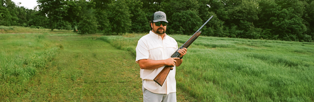 man wearing scout shirt outdoors, durable fabric for hunting and fishing for men