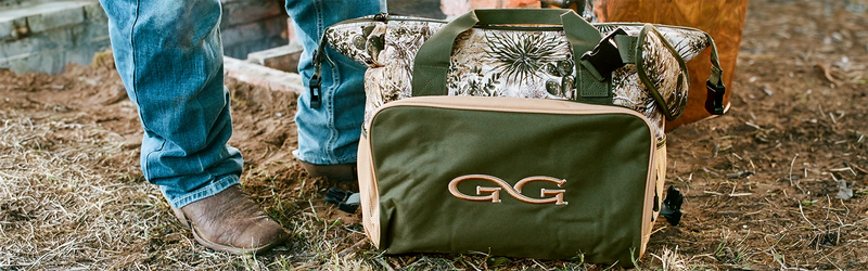 soft cooler bag with camo print, the GameGuard Cooler Bag, keeps drinks cold with ice