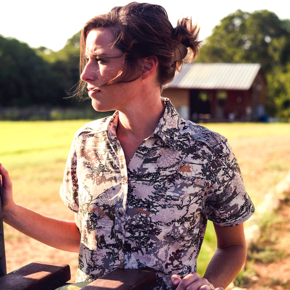 Woman outdoors wearing Ladies' GameGuard Digital Camo Shirt