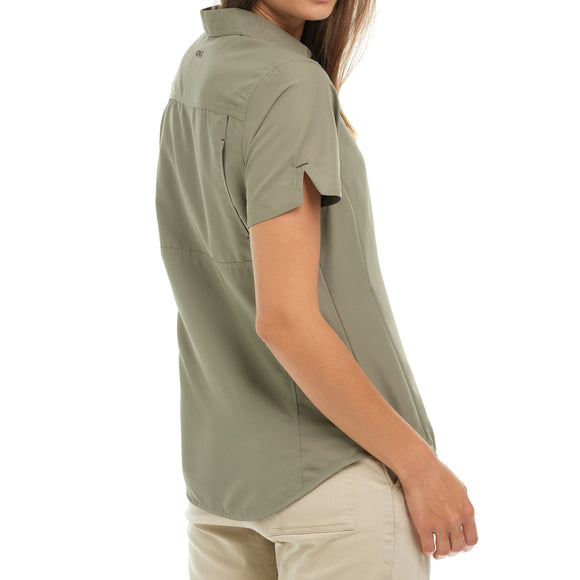 Back view of a woman wearing the Mesquite Ladies' Shirt, a short-sleeve shirt with microfiber fabric in green.