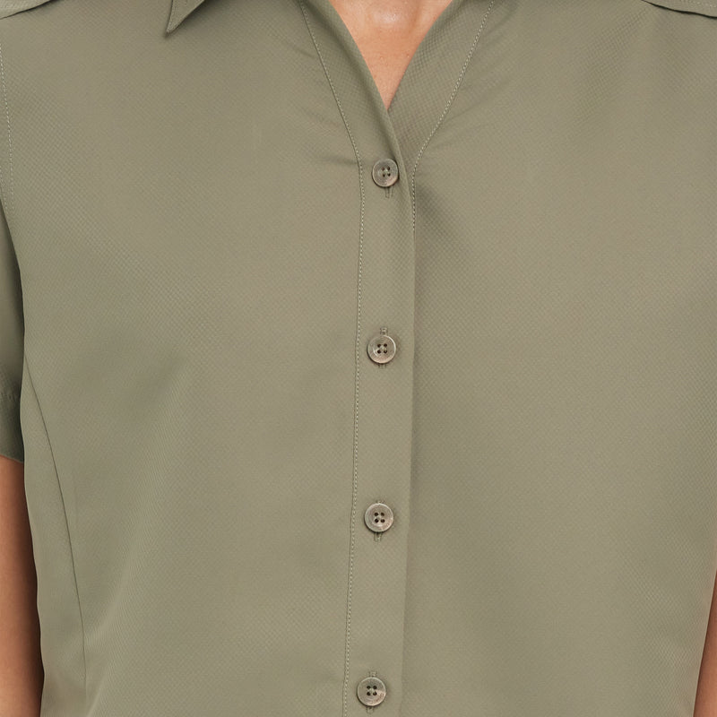 Load image into Gallery viewer, Close-up of the front of the Mesquite Ladies&#39; Shirt, showing the buttoned collar and microfiber fabric in green.
