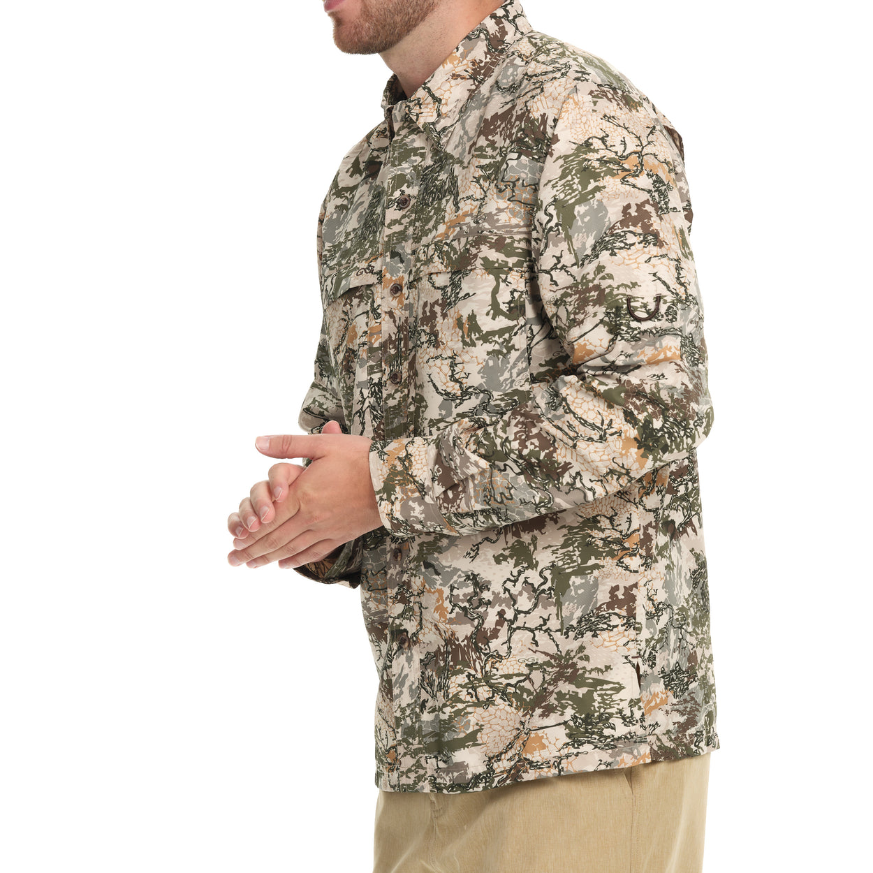 Side view of a man wearing the GameGuard Explorer Shirt (long sleeve), a shirt with a digital camouflage pattern.