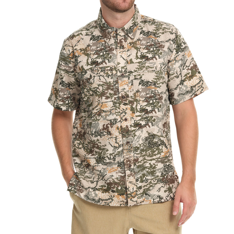 Load image into Gallery viewer, Front view of a man wearing the GameGuard Digital Explorer Shirt, a short-sleeve shirt with a digital camouflage pattern.
