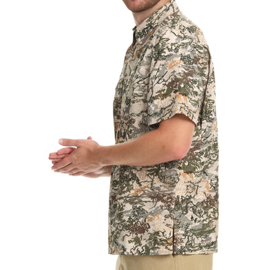 Side view of a man wearing the GameGuard Digital Explorer Shirt, a short-sleeve shirt with a digital camouflage pattern.