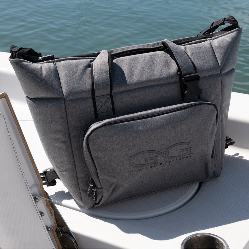 Cargue la imagen en el visor de la galería, gray GunMetal Cooler Bag sitting on a boat in the sun keeping drinks and food cold
